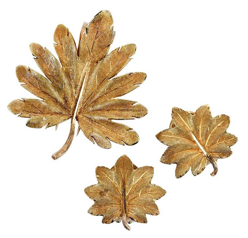 Buccellati 18kt. Gold Earclip and Brooch Set: textured leaf design, earclips hand engraved "M. Buccellati", stamped "750" and with mark, brooch hand engraved "M. Buccellati, 750", 18kt. yellow gold, 3/4 x 7/8 and 1-1/2 x 1-3/8 in., 14.7 grams Pro