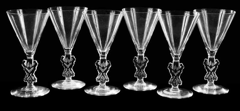 Six R. Lalique Strasbourg Small Glass Stems: model introduced in 1926, model number 5086, acid etched "R.Lalique", 5 in. Provenance: Estate of Dr. Philip George, Memphis, Tennessee