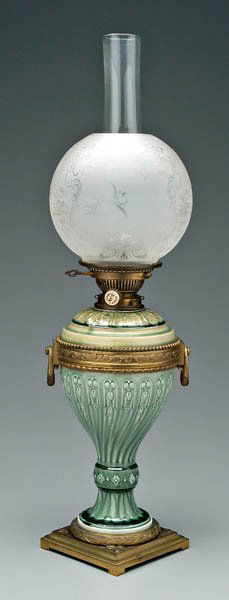 Theodore Deck faience lamp,: spiral urn form with teal colored glaze, impressed "TH Deck" inside foot, ormolu wave motif banding, swag handles and footed square base, wick adjustor marked "Hinks No. 2 Duplex", French, late 19th c