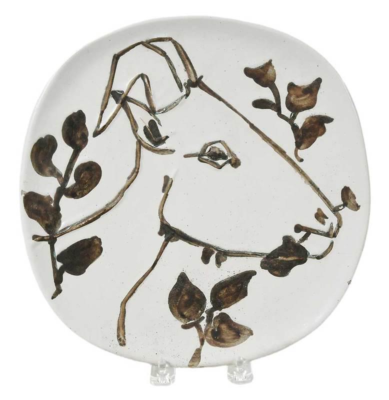 Pablo Picasso: (Spanish, 1881-1973)Tˆte de chŠvre de profilÿ(A.R.108), 1950, edition of 50, stamped verso "Madoura/Plein/Feu" and "Empreinte/Originale De/Picasso", white earthenware clay plate, decoration in oxid