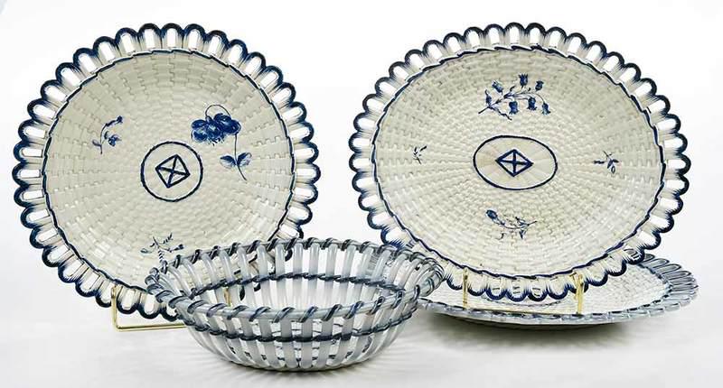 Four Blue and White Basketweave Creamware Pieces: British, late 18th/19th century, two oval dishes, one marked "Neale & Co.", one with hand painted floral decoration, largest 10-1/8 in.; one round dish, hand painted floral decoration, 8-3/4 in.; bask