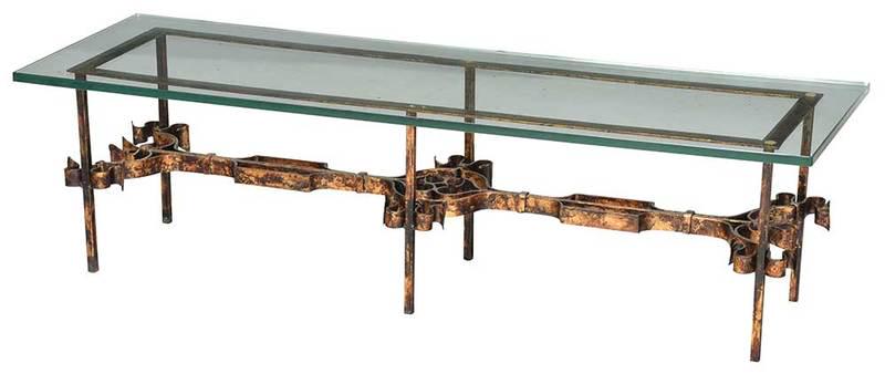 Gilt Wrought Iron Glass Top Coffee Table: rectangular thick glass top over scrolled wrought iron frame, 16 x 20 x 60 in.; Provenance: Estate of Col. Robert and Mrs. Linda Newton, Marshall, Virginia