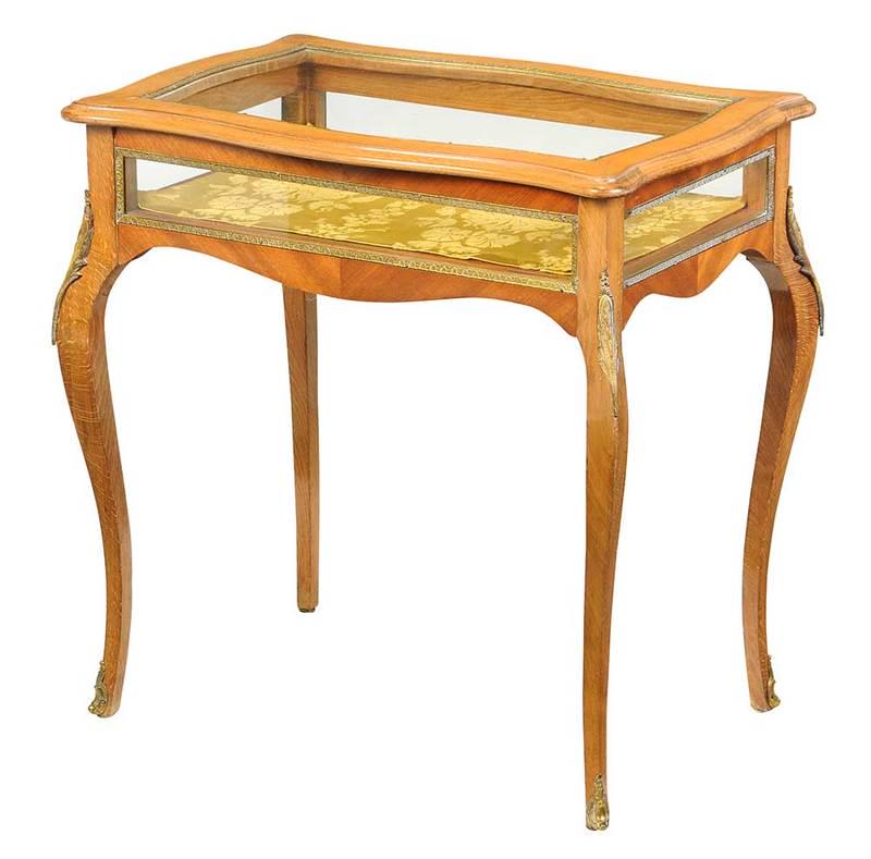 Provincial Louis XV Style Vitrine Table: 20th century, beech veneer, set with gilt mounts, hinged lid, set with fabric lined interior, 25 x 25 x 17 in.; Provenance: Collection of Wilfred and Eleanor Funk, Montclair, New Jersey; By descent in