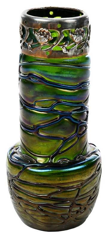 Threaded Art Glass Vase: early 20th century, possibly Loetz, green iridescent cylindrical vase with threaded design, metal collar with floral motif, 6-1/4 in.; Provenance: Private Collection, Mars Hill, North Carolina