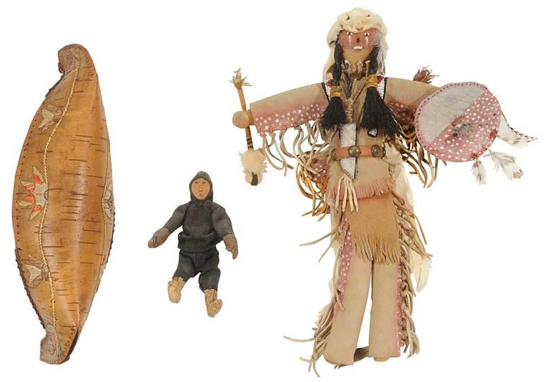 Cherokee Doll with Model Canoe and Small Figure: 20th century, doll with beaded features, decorated hide/leather clothing and fur headdress, with shield, mace and quill containing bow and arrows, 13-3/4 in.; together with birch bark canoe with flora