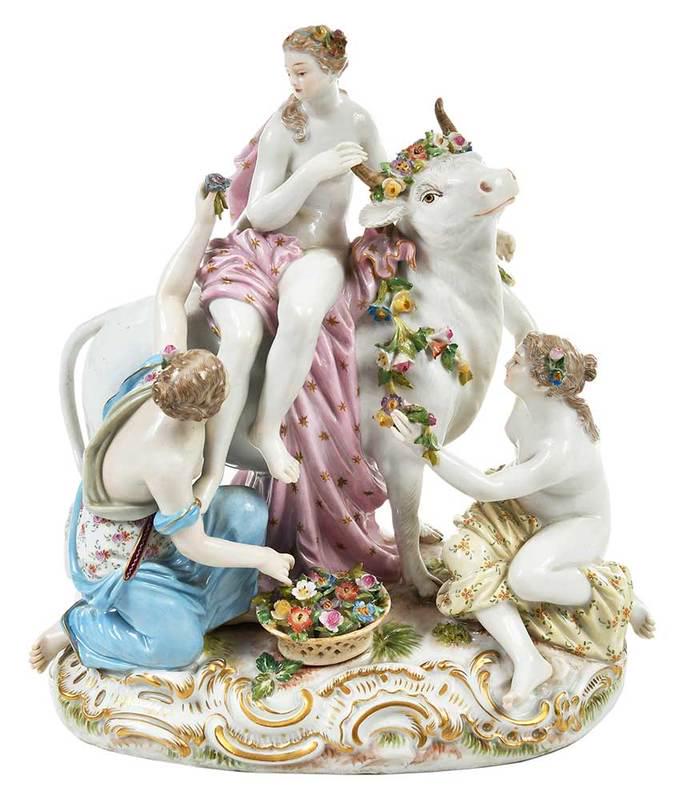 Meissen Figural Group of Europa and The Bull: German, 19th century, Europa seated on garlanded bull with two women, after the model byÿJohann Friedrich Eberlein, Meissen blue crossed swords mark to base, incised "2697" and "147" on base, 8-1/2 x