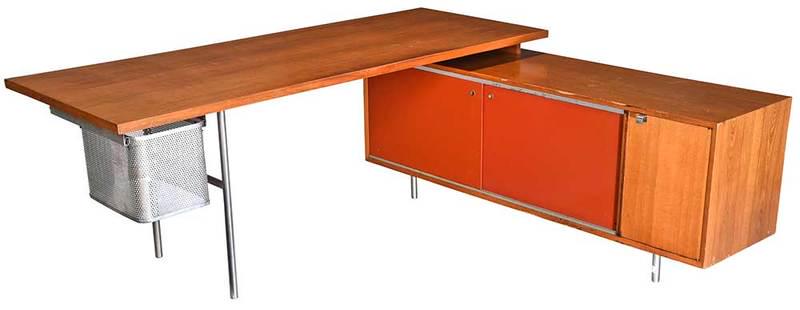 George Nelson Executive Desk: circaÿ1970s, unsigned, walnut desk section with chromed legs and mesh file drawer, two sided cabinet with red sliding doors and single hinged door, desk 30 x 78 x 30 in.; cabinet 26 x 87 x 18-1/2 in.