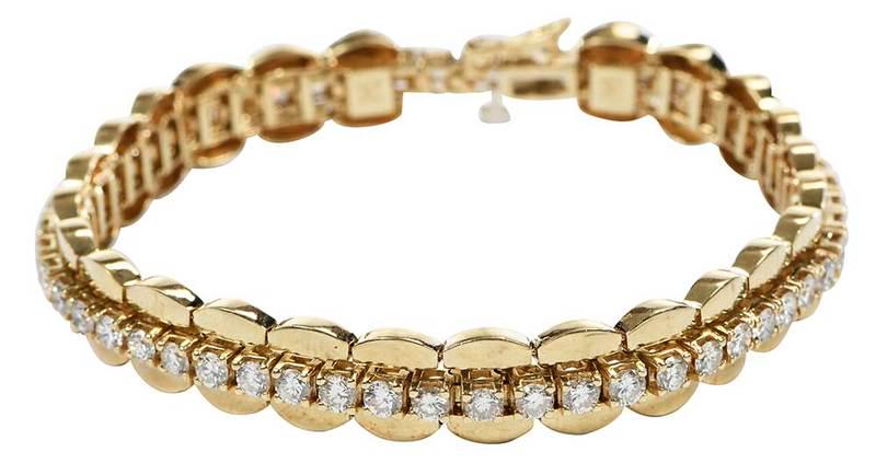 14kt. Diamond Tennis Bracelet and Jacket: tennis bracelet with 55 round brilliant diamonds estimated total weight 5.50cts., H-J, SI to I, stamped "14K", yellow gold, 7-1/2 in. lg., 14.1 grams,ÿsmall spots of tarnish, wear and scratches consi