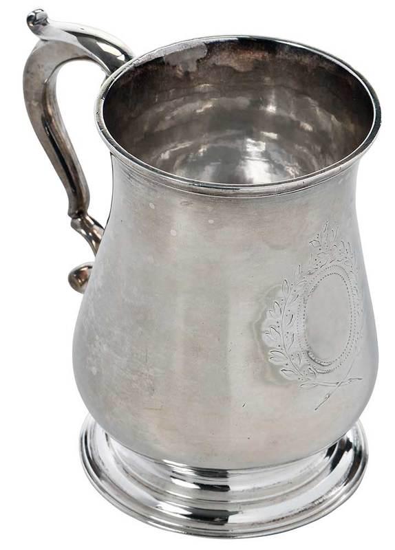 George II English Silver Mug: London, 1753, bulbous form, scroll handle,ÿengraved central wreath,ÿmarks for William Shaw & William Priest,ÿ10.21 oz. T., 4-3/4 in.; Provenance: S. J. Shrubsole, New York, 1975, (with original rec