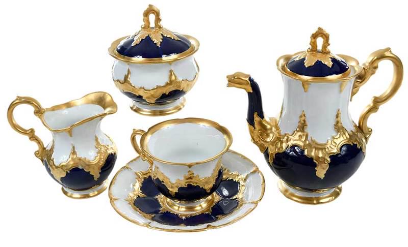 15 Piece Meissen Coffee Service: German, late 19th/early 20th century, set of six coffee cups, six saucers, creamer, sugar jar, and coffee pot, gilt highlights on white and cobalt ground, Meissen blue crossed swords marks on bases, t