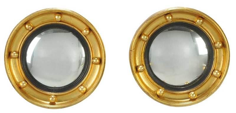 Pair Regency Gilt Diminutive Convex Mirrors: British, early 19th century, each with gilt frame centering a convex mirror plate, 5-1/2 in.; frame 9 in.; Provenance: Property from an Important South Carolina Estate