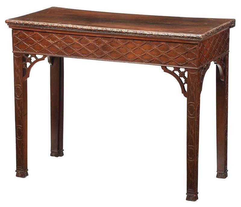 Chinese Chippendale Carved Mahogany Games Table: British, 18th century, leather lined top playing surface, oak secondary, blind fret skirts and legs, 29 x 36-1/4 x 17-1/2 in.; Note: This item descended in the Russell family of Boston, Massachusetts 