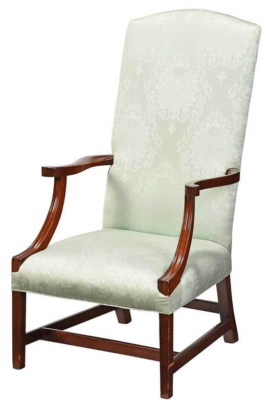 An American Federal Mahogany Lolling Chair: 1790-1810, mahogany frame with scrolled arms, set with pale blue upholstery, accompanied by copy of receipt dated May 1988 from Elizabeth R. Daniel Antiques, Chapel Hill, North Carolina, indicating a 