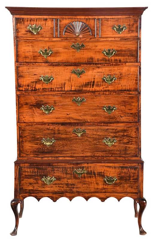 New England Queen Anne Tiger Maple Chest: 18th century, chest on frame, highly figured maple, chestnut and pine secondary, probably original batwing brasses and escutcheons, 63-1/2 x 38-1/2 x 18-1/2 in.; Provenance: Estate of Gail W. Dane, De
