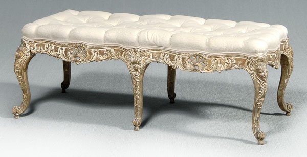 Louis XV carved and gilt bench,