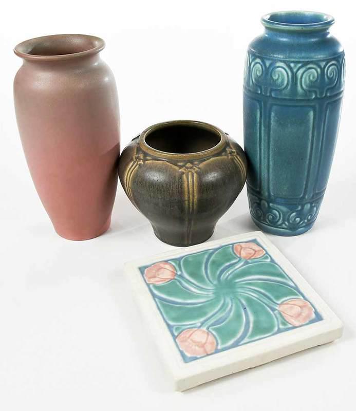 Three Rookwood Art Pottery Vases and One Trivet: American, 20th century, blue glazed vase, impressed decoration; mottled pink and green vase; brown glazed vase; square trivet with poppies; largest 9 in.; all with impressed factory marks to bases, Pr