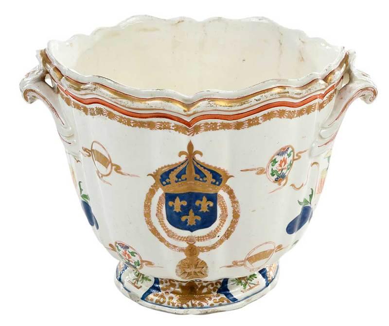 Export Style Enameled Ceramic Wine Cooler: probably British, 19th century, possibly Samson creamware, decorated with crowned blue shield with three fleur de lis on two chains, stylized clouds and flowers, gilt accents, scalloped rim, with hand