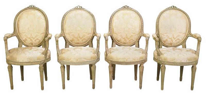 Four Louis XVI Style Upholstered Arm Chairs: French, 19th/20th century, carved acanthus and ribbon decoration with green-grey paint, 39-1/2 x 22-1/2 in., 19 in. seat, Provenance: Private Collection, South Carolina