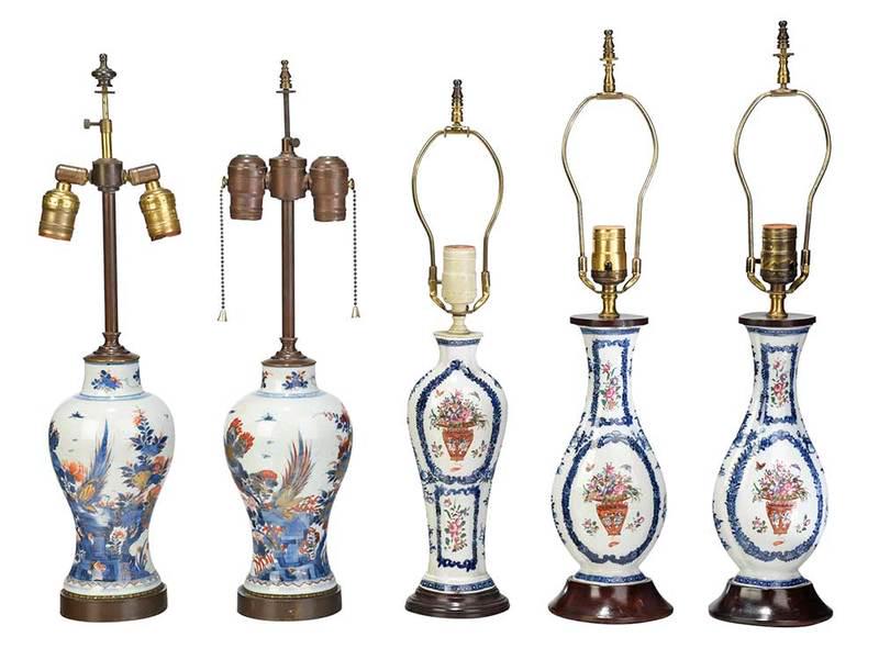 Five Chinese Porcelain Vases Mounted as Lamps: 18th/19th century, pair Chinese Imari baluster shaped with phoenix and floral design, 17 in.; three similar famille rose with floral baskets within blue festoon borders, 14 in. to 15 in., Provenance: