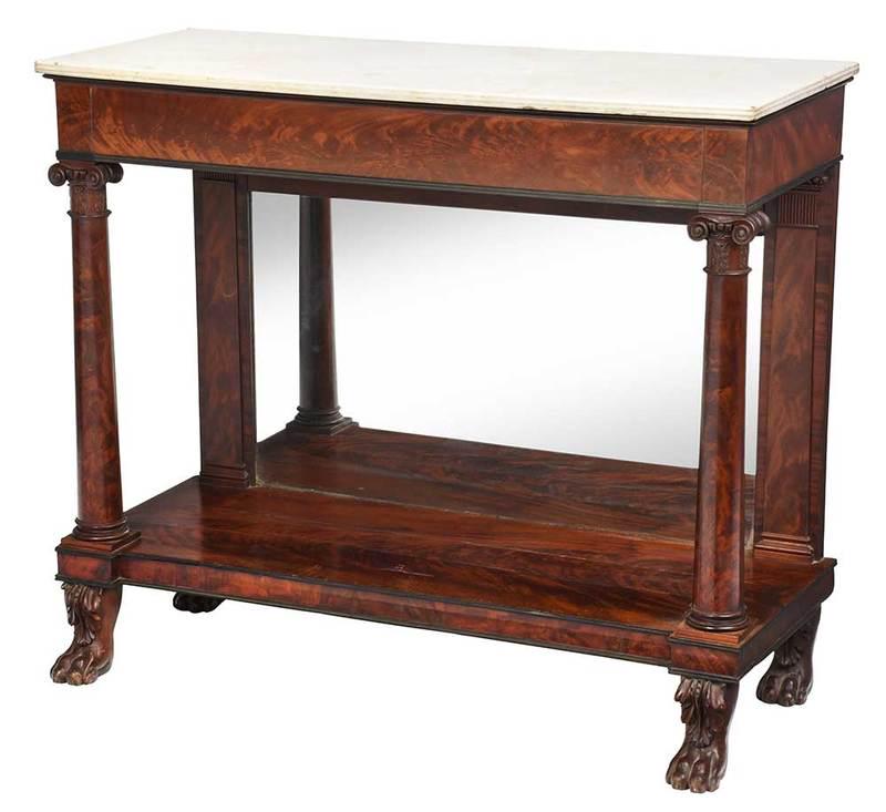 New York Classical Figured Mahogany Pier Table: possibly the shop of Duncan Phyfe, 1815-1825, original white marble top with reeded edge, over a brass inlaid frieze, over pilaster and column support with mirrored back, on paw feet, highly figured m