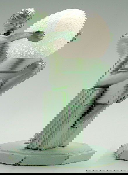 Frankart Art Deco lamp,: woman holding globe, seated on pillar, cast metal with original green-painted surface, original satin glass globe, octagonal base, marked "Frankart", 8-1/2 in. Chips and losses to green-painted surfac