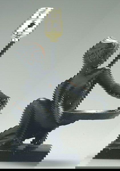 Frankart lamp,: kneeling nude woman holding tray, marked on back "Frankart" with patent number, black and brown painted surface, 9 x 8 x 6 in. Chips and losses to surface, working order.