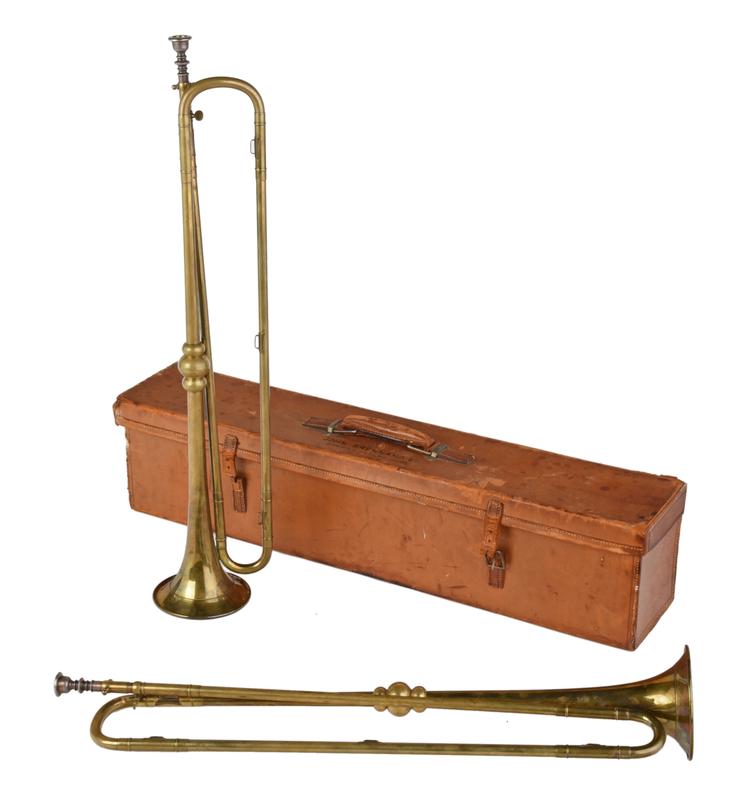Two English Brass Presentation Horns: to Sheriff John Brennand, Esq., both engraved "J.B. 1915-1916", horns and detached silver mouth pieces engraved "Hawkes & Sons, London", brown leather case marked "John Brennand Esq./Sheriff of Yorksh