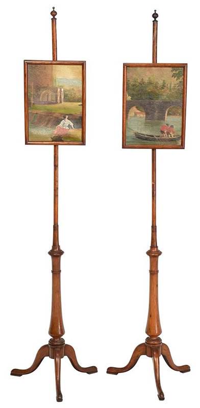Pair of Georgian Oak and Painted Pole Screens: British, 19th century, each with oil on canvas adjustable screen, on oak tripod base, 56-1/2 in., Provenance: Private Collection
