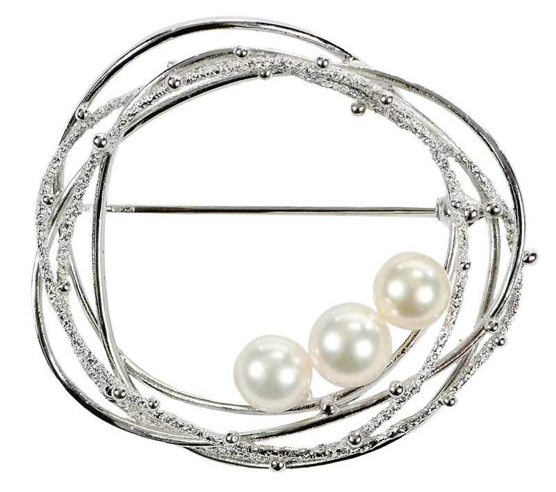 Mikimoto Silver & Pearl Brooch: three cultured pearls ranging from approx. 6.6 to 7.2mm, stamped "S.M" with Mikimoto maker's mark, rhodium plated sterling silver, 1-1/2 x 1-1/2 in., 8.6 grams, Provenance: Private Collection