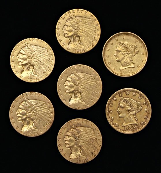 Seven U.S. $2-1/2 gold coins