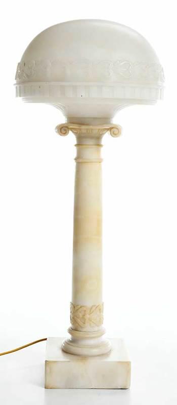 Alabaster Column Form Lamp: Continental, 20th century, on square base, with detachable two piece shade, scrollwork borders in shallow relief, 16 in. (to socket)Provenance: Estate of William A. Little, Charlottesville, Virginia