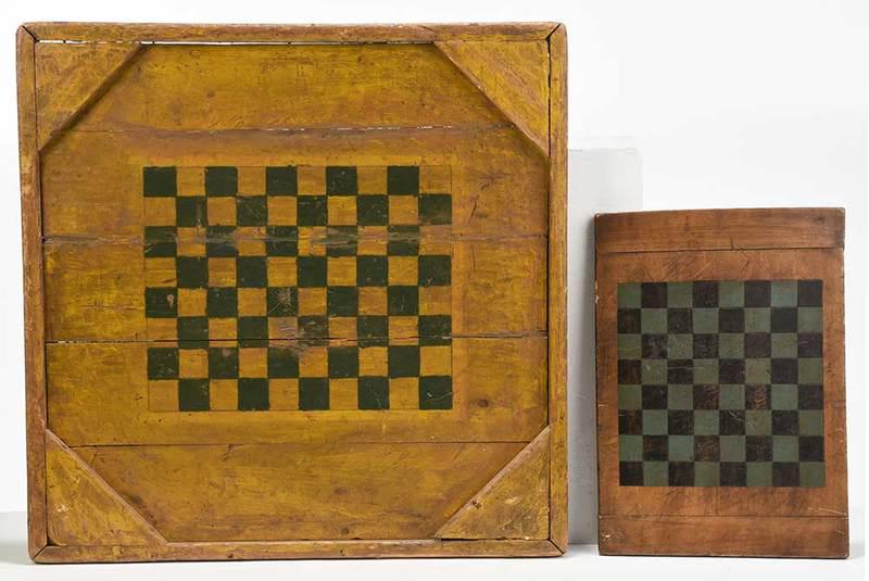 Two American Country Paint Decorated Game Boards: 19th century, larger example with yellow ground with green checkerboard, verso with additional game board with game piece recesses; smaller example with blue and black checkerboard paint, bread board 