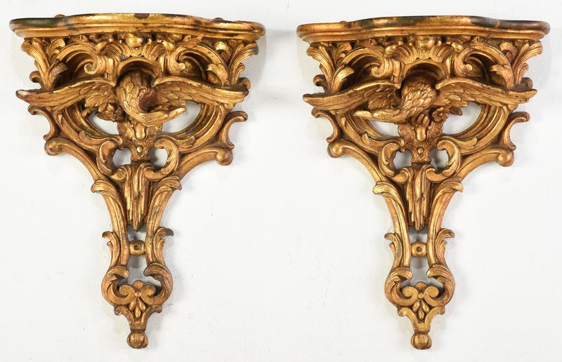 Pair Chippendale Style Gilt Eagle Brackets: 20th century, each molded composition with gilt surface, centering a spread wing eagle, 17 in. high