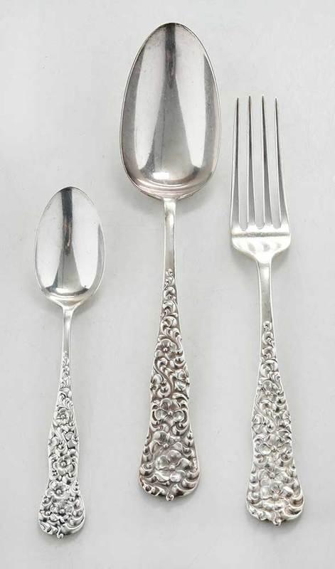 Dominick & Haff Rococo Sterling Flatware, 24 Pieces: American, late 19th century, including twelve 7-1/2 in. forks; eleven 6 in. teaspoons; 8-1/2 in. serving spoons, monograms, marks for Dominick & Haff, 35.25 oz. T.Provenance: The Millie West Estate, W