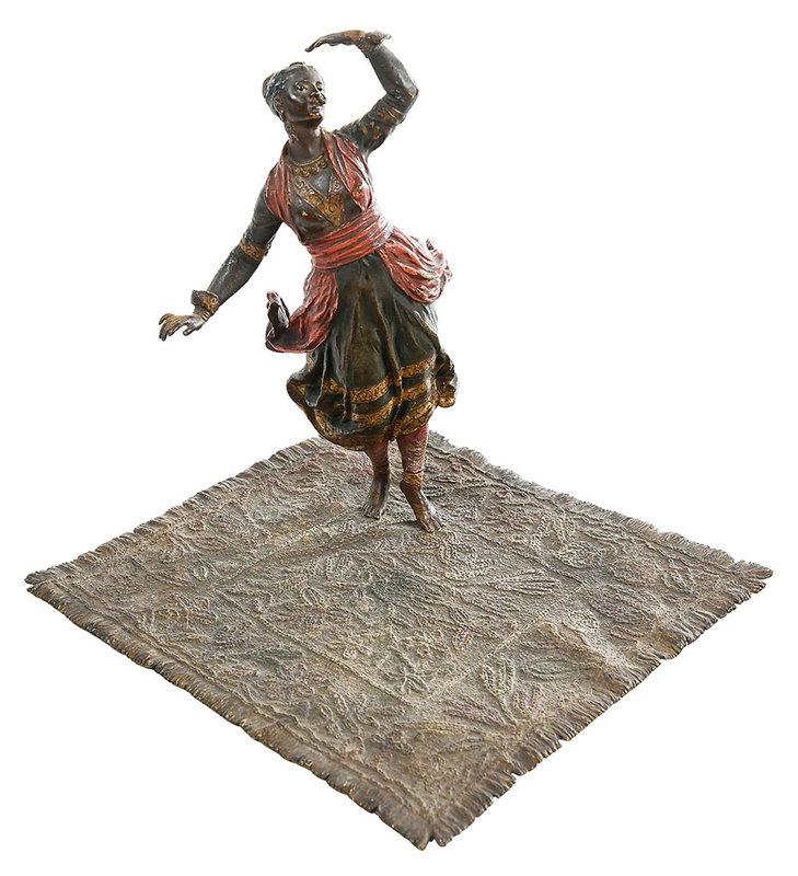 Franz Bergmann Cold Painted Bronze: Franz Xavier Bergmann (Austrian, 1861-1935), female figure dancing on a carpet, carpet impressed underneath "B" within an urn/"Geschutzt", dancer's hem with impressed Bergmann mark, "Geschutzt" and "6