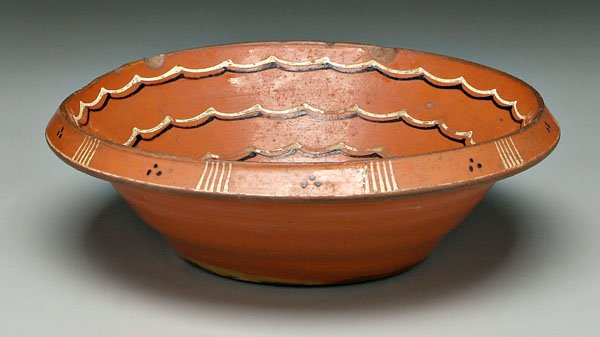 Slip decorated redware bowl,