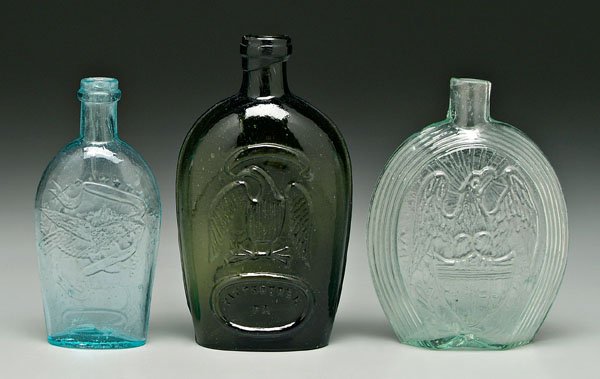 Three glass historic flasks:
