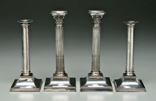 Two pairs silver plate candlesticks
