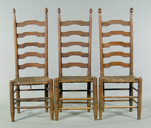 Three maple ladderback chairs, turned po