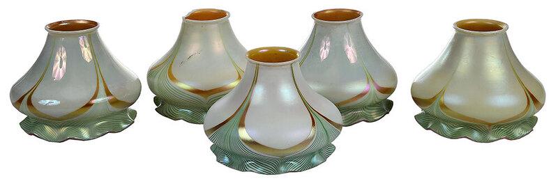 Five Steuben Pulled Feather Art Glass Shades: American, 20th century, opaque iridescent white floriform shades, ruffled outer rim, green pulled feather design with gold tips, gold iridescent interior, faint stenciled silver Steuben marks, each ap