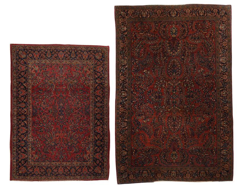 Two Sarouk Rugs: Persian, mid 20th century, both with red fields, leaf and floral sprays in blue, green and white, 6 ft. 7 in. x 4 ft. 2 in. and 4 ft. 11 in. x 3 ft. 5 in., Provenance: Estate of James Frank Dennis, Hi