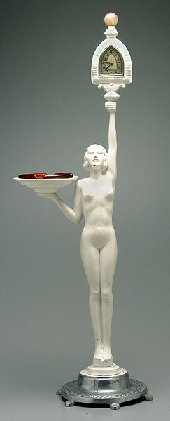 Frankart style nude female figure: holding clock marked "Lux," other hand holding ashtray, footed base, cast metal, probably repainted, several minor chips, 42-1/2"