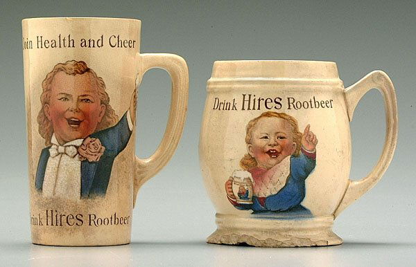 Two Hires Root Beer ceramic mugs: one marked "Join Health and Cheer, Drink Hires Root Beer," smiling boy holding a mug, small rim chips, general discoloration, marked on bottom "2327," 5-1/8"; other with boy pointing, marked "Drink Hi