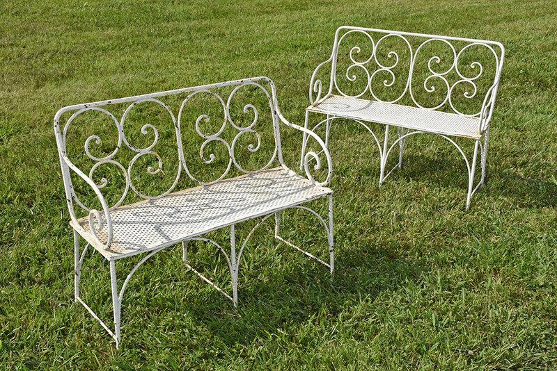 Pair of Vintage French Garden Settees: late 19th/early 20th century, wrought iron, each with scrolled back and arms, grille work seat, 34 x 40 x 16-1/2 in.; Provenance: The Estate of William N. Banks, Jr., Newnan, Georgia