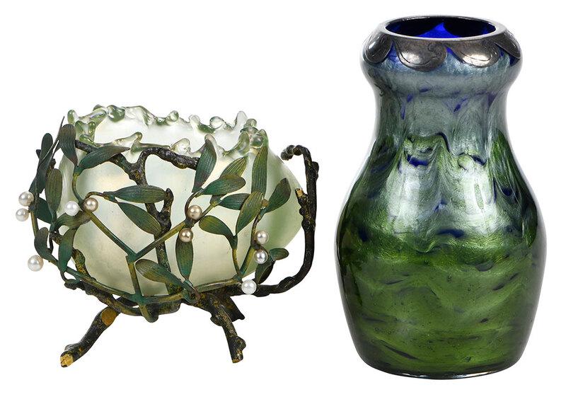 Two Art Glass Vases, Including Loetz Tatiania: probably Continental, 20th century, Tatiania vase with green exterior and blue interior, silver overlay over rim in wave pattern, several numbers scratched on base, 5-1/4 in.; iridescent egg shaped va