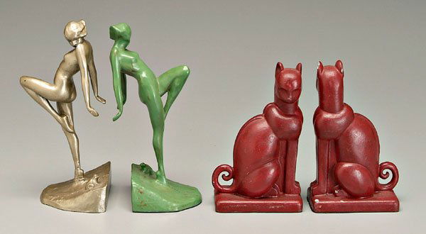 Two pairs bookends, figures,: all cast metal: pair Art Deco cats, one marked on front "V..2"?, 8 in., [surface chips, some repainting;] pair nude female figures looking down at frogs, "Copyright 1922" on bases, possibly Frankart,