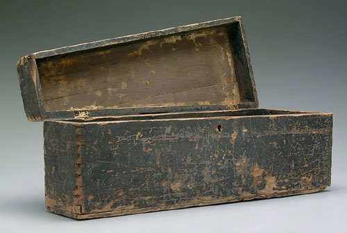 Coffin-shaped wooden lidded box, old bl