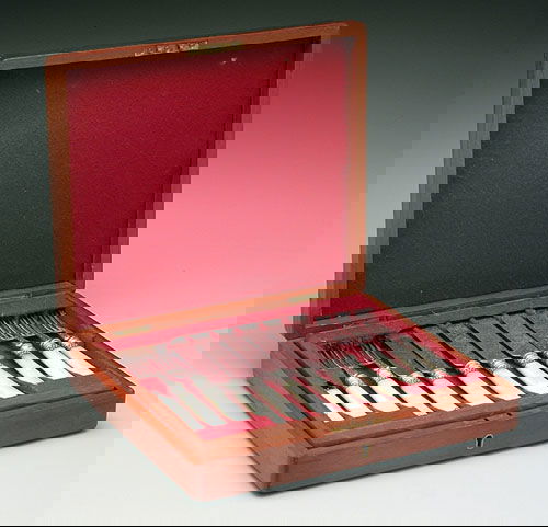 12-piece cased silver-plated fruit set,: 12-piece cased silver-plated fruit set, six knives, six forks, mother-of-pearl handles, two handles cracked, one handle repaired, in fitted two-tier case