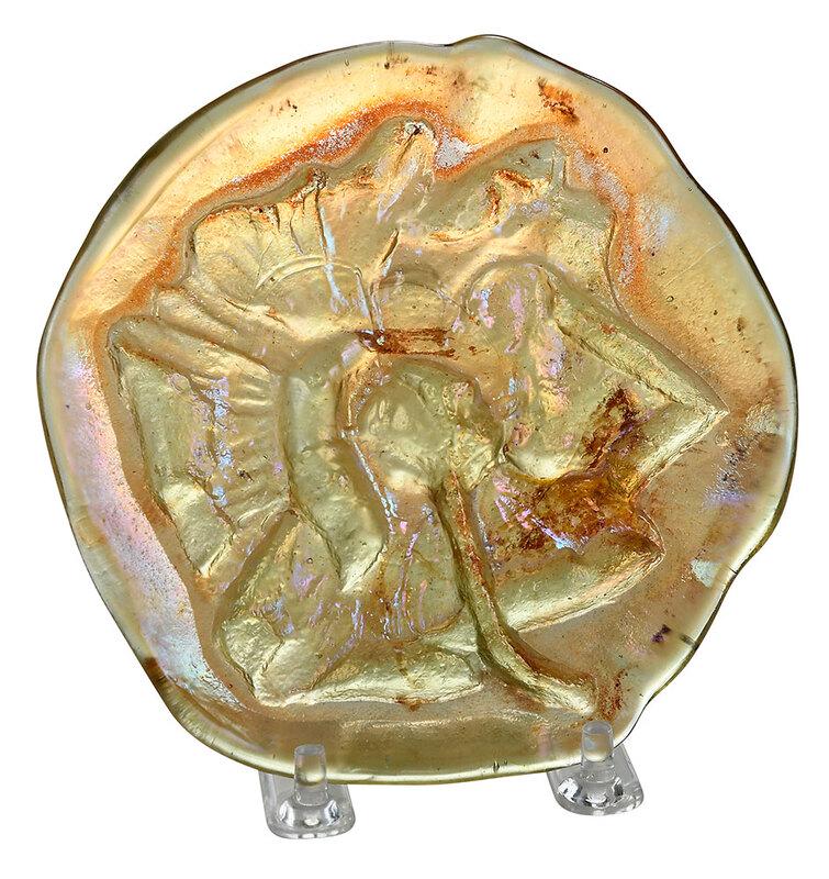 Favrile Art Glass Whimsy Attributed to Tiffany: American, early 20th century, gold favrile disk impressed with a floral design, 5-1/4 in. - Provenance: William M. Rivkin, Master Restorer for Tiffany Stained Glass 1925-1948; A Shenandoah Valley Esta