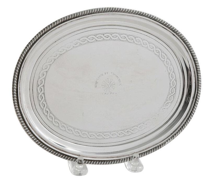 George III English Silver Teapot Stand: Edinburgh, 1806, oval with gadroon border four scroll feet,ÿheraldic device with sun and "HEQULIER ET VIGOUREX" marks for G. Fenwick,ÿ5.67 oz. T., 3/4 x 6-3/4 x 5-1/2 in. - Provenance: Garra
